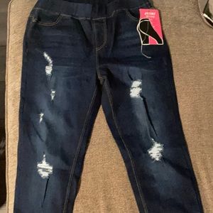 NWT soft pull on dark jeans with distressed look on legs.Size L